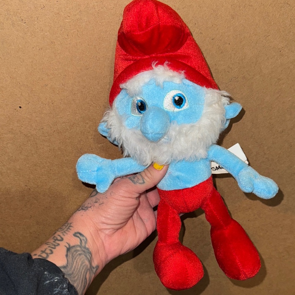 Blue and Red Plush Doll